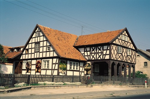 Nina's original home studio and gallery with pieces displayed on exterior walls.